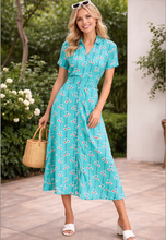 Laden Sie das Bild in den Galerie-Viewer, Swingkleid Jonie Gerbera mit Gerberablühten, Blau
